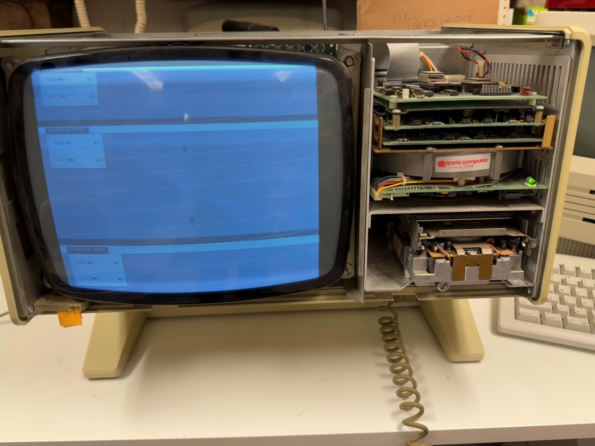 Apple Lisa with case off, showing strange tripled screen